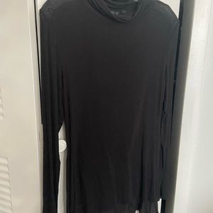 stretchy long sleeve.. Just right. A bit sheer But not too much.